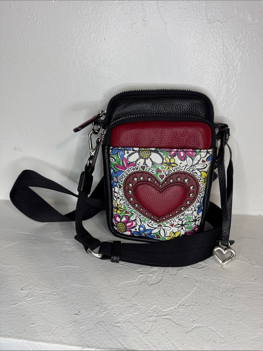 Brighton Scribble Garden black & red leather mini utility bag